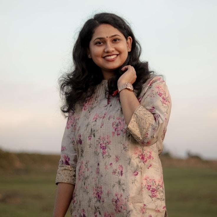 Mira Iyer, Client Relations Director, discussing corporate gifting strategy with business clients